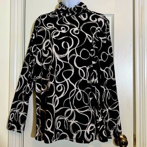 Susan Graver print long sleeve turtleneck. Looks great alone or with a sweater.